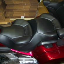 Dual all Black Leather with Halfmoon pattern.  Seat moved up and back 2"