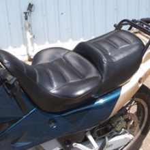 Moto Guzzi Quota: Day-Long Solo, Black Vinyl with Rectangle pattern.